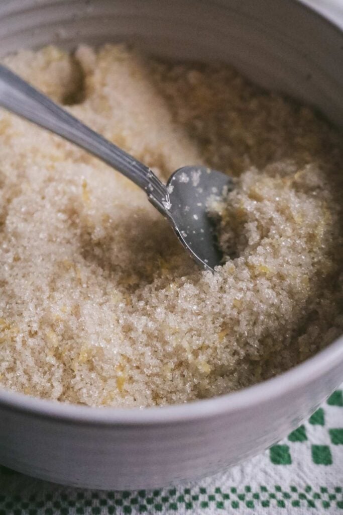 close up view of a bowl with homemade lemon sugar.