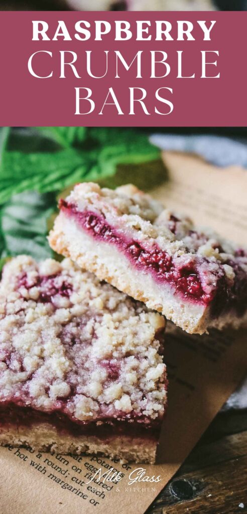tall pin that reads "raspberry crumble bars" with a close up view of the bars to highlight the shortbread crust, jammy filling packed with raspberry jam and fresh berries, plus the crunchy crumb topping.