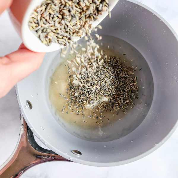 pouring lavender in a pan.