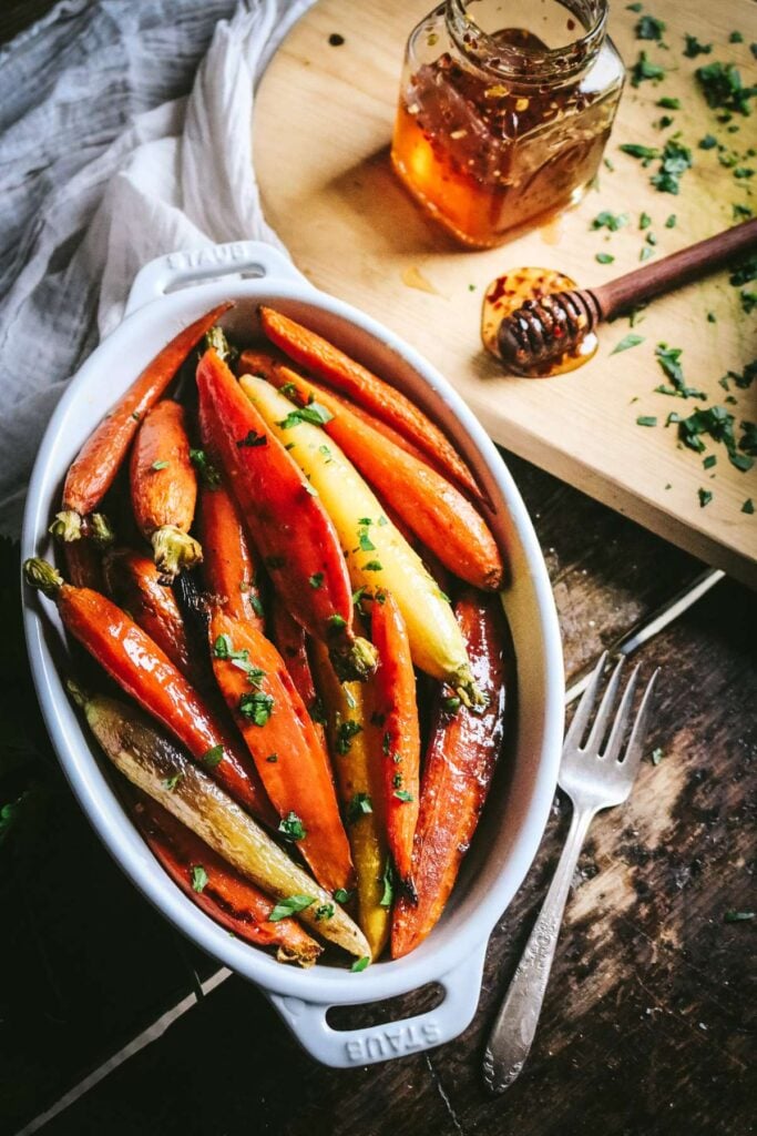 roasted rainbow carrots topped with hot honey.
