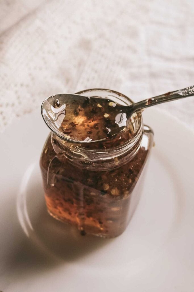 vintage spoon dripping with hot honey.