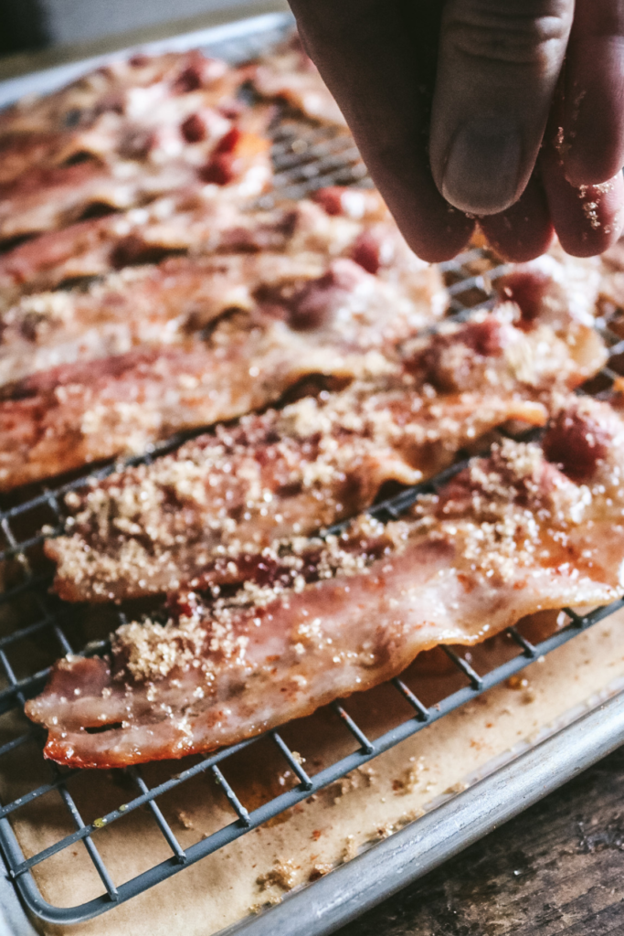 sprinkling brown sugar on bacon before baking.