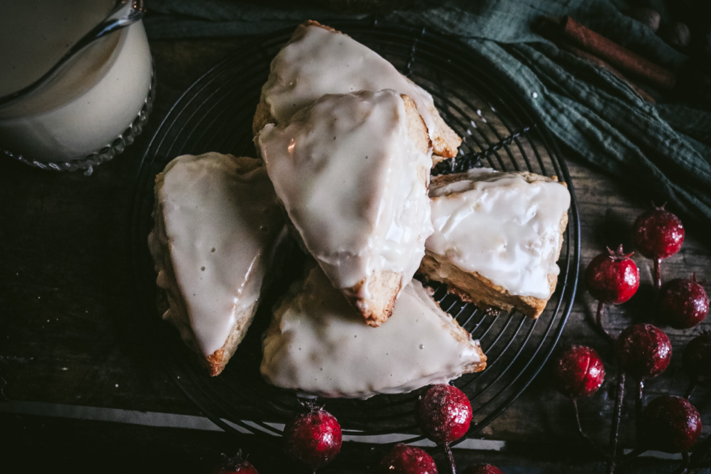 overhead view of eggnog scones cooling on a wire rack.
