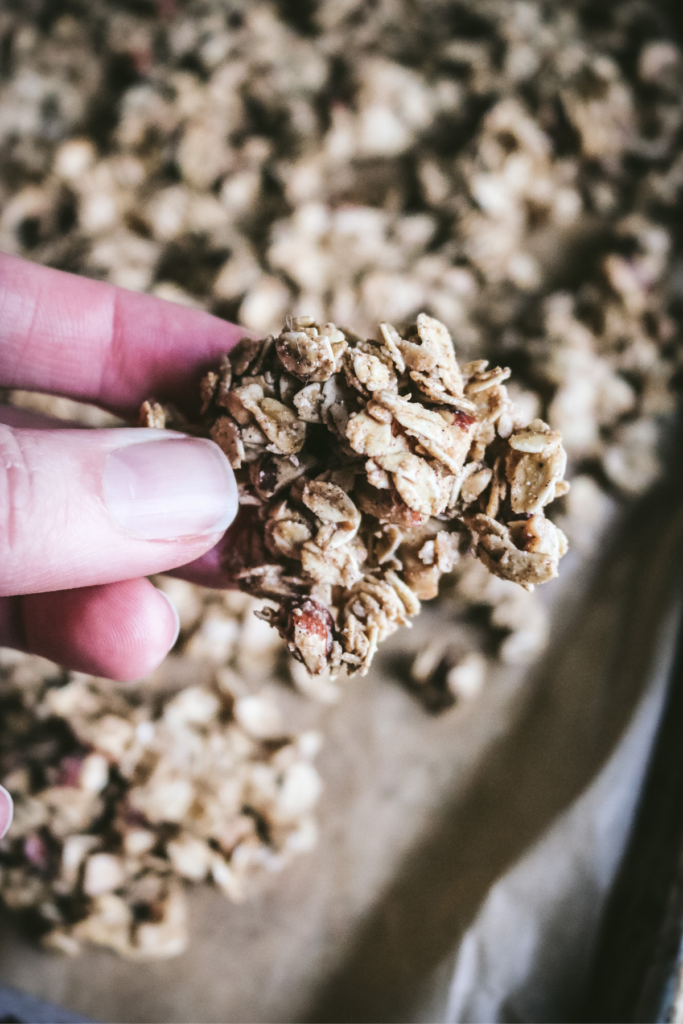 close up view of hazelnut granola clusters.