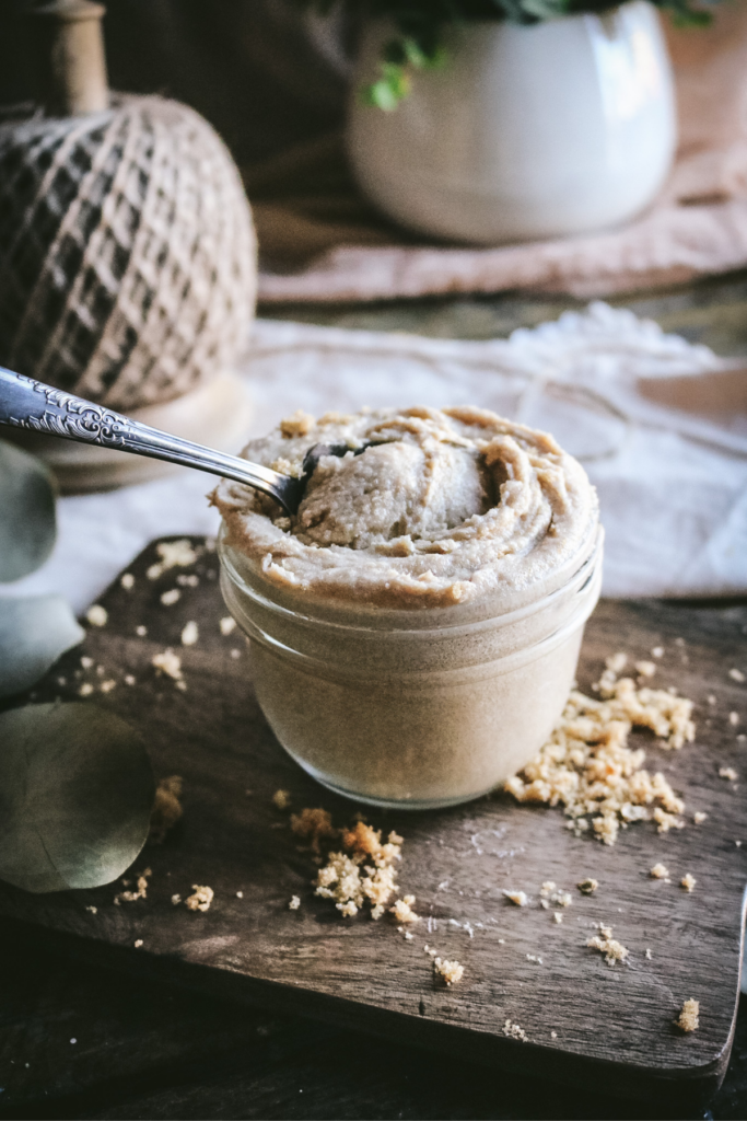 mason jar with whipped brown sugar body scrub.