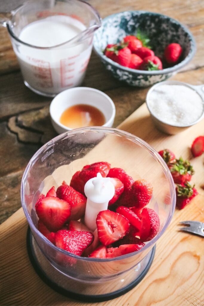 fresh strawberries in a food processor.