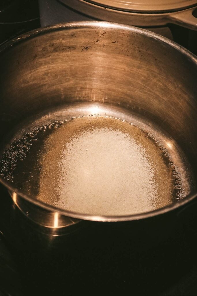 melting sugar in a pan to make dry caramel.