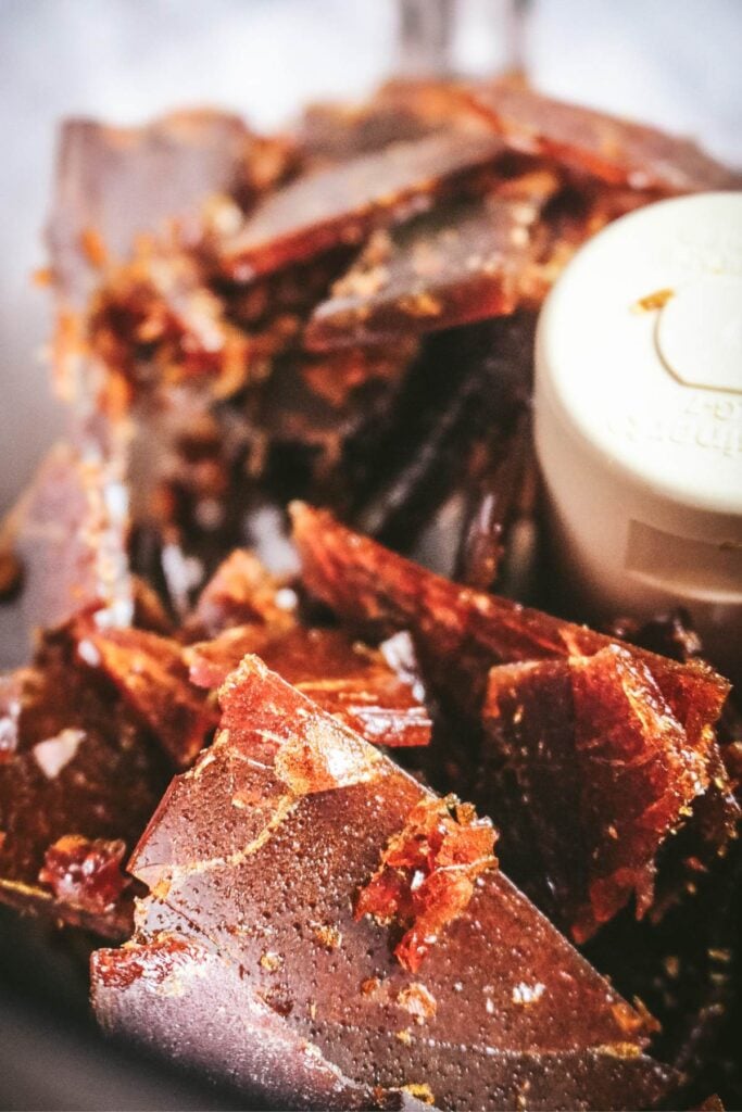 shards of caramel in a food processor to make caramel sugar.
