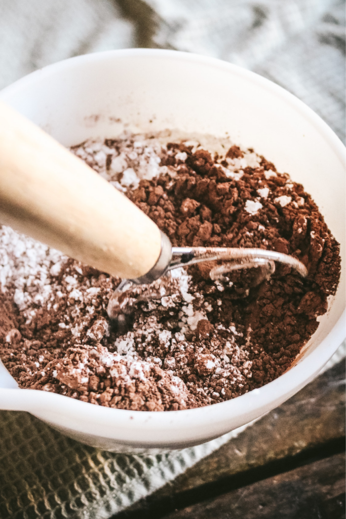 mixing hot cocoa ingredients in a bowl.