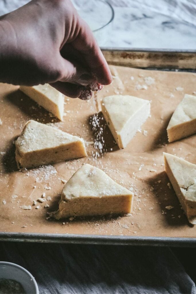sprinkling vanilla sugar on vanilla bean scones before baking to add extra texture.