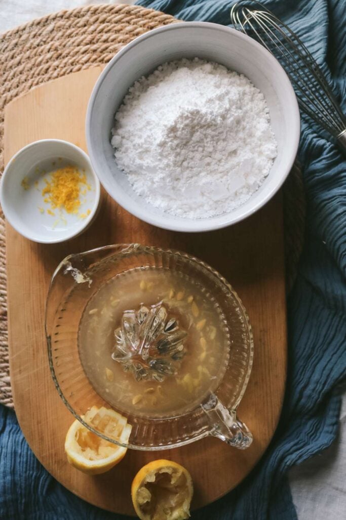 overhead view of ingredients to make an easy lemon glaze to coat muffins or scones.