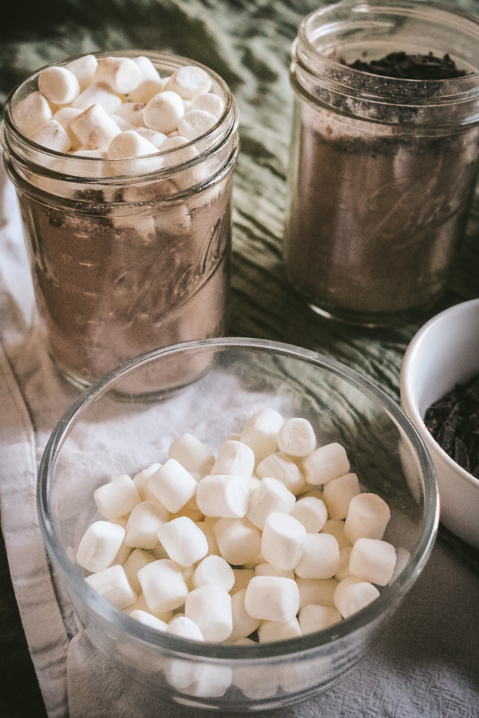 jar of homemade hot chocolate with marshmallows on top.