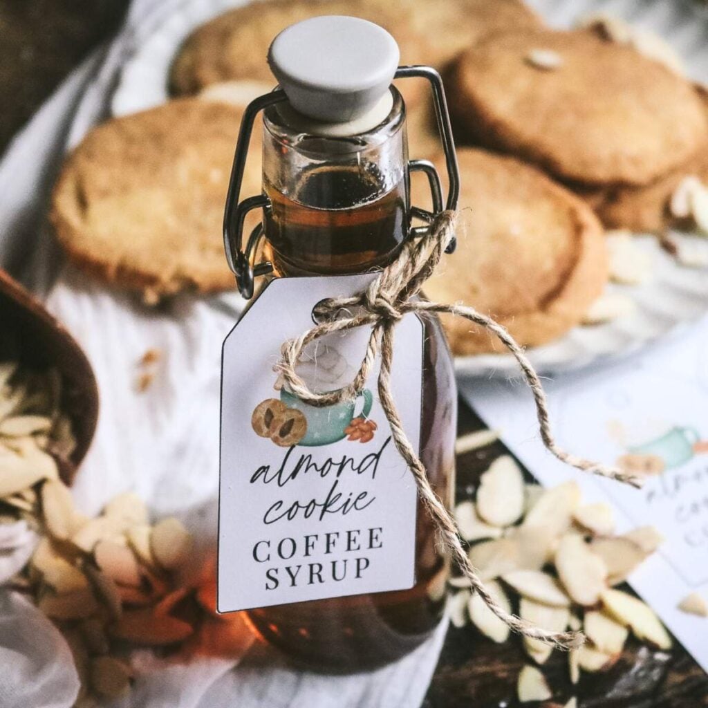a glass bottle of homemade almond simple syrup for coffee with vanilla and butter notes for that full cookie flavor.