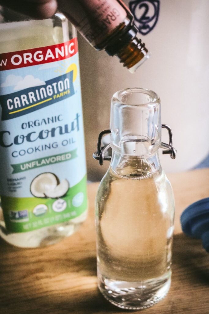 adding grapefruit essential oil to homemade wood cutting board oil.