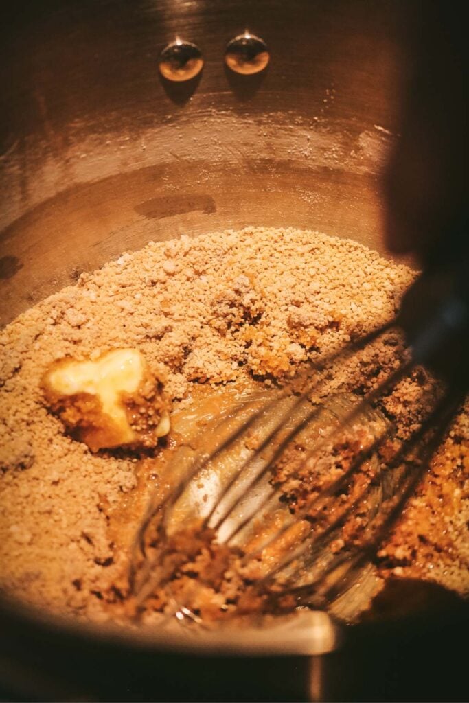 whisking butter into brown sugar for homemade butterscotch pudding.