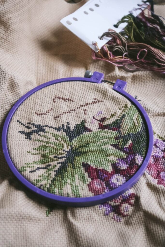 close up view of a cross-stitch project in progress.